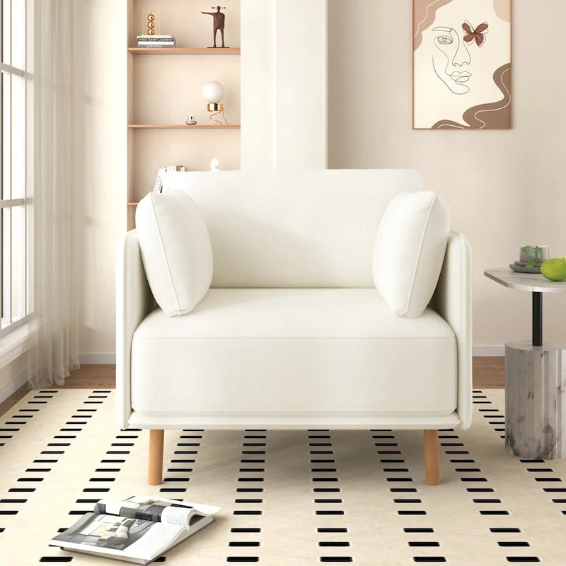 Poltroncina in tessuto con gambe in legno