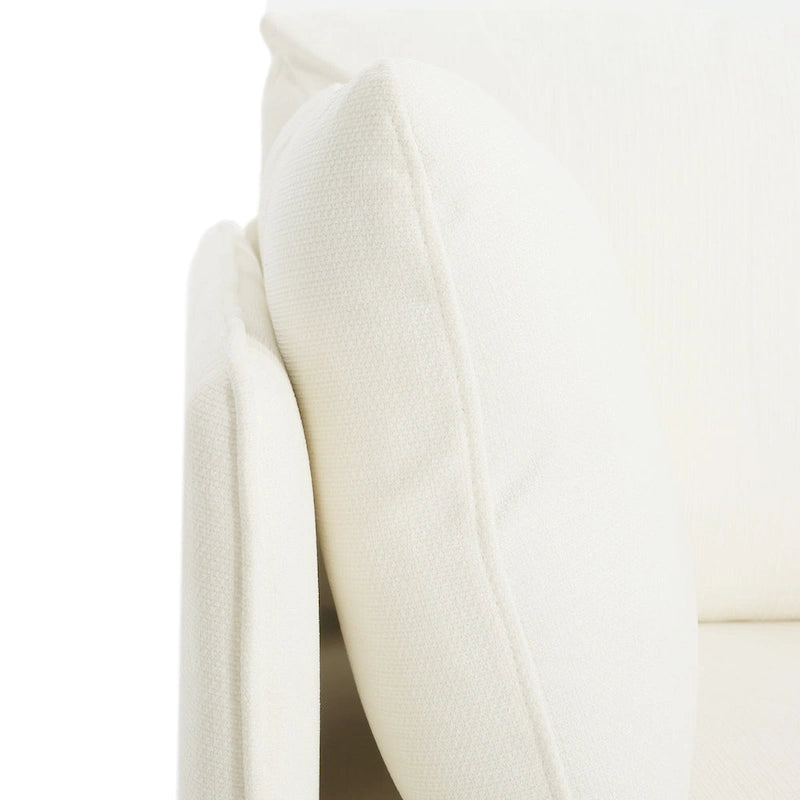 Poltroncina in tessuto con gambe in legno