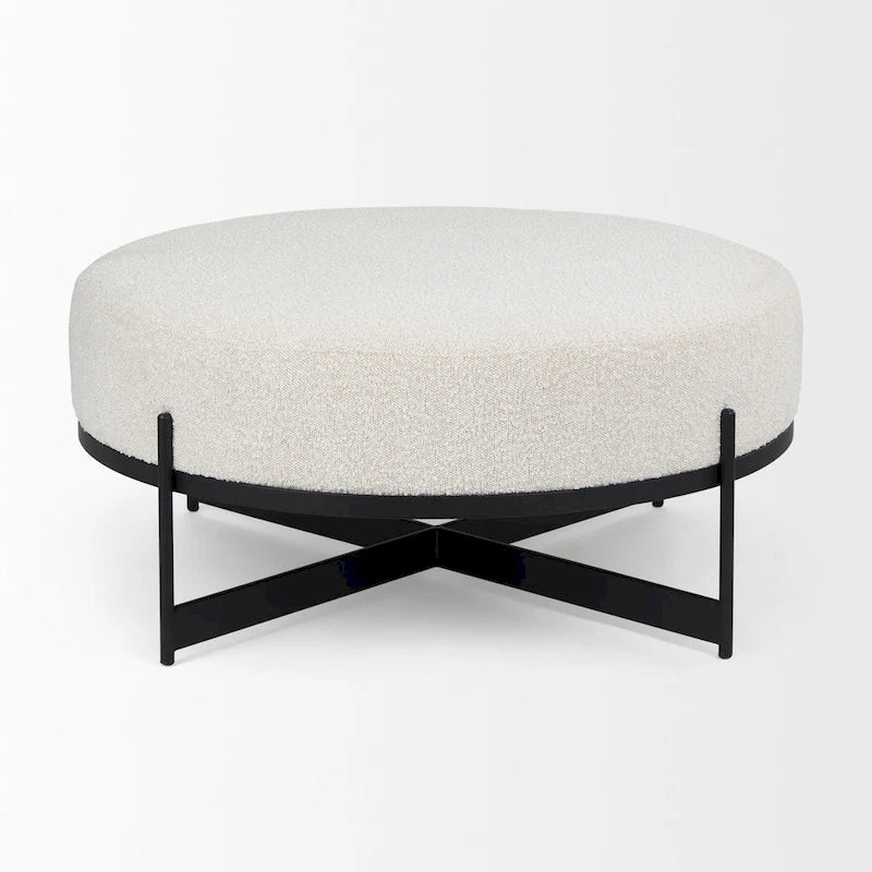 Pouf rotondo in tessuto bouclé color crema con base in metallo nero