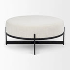 Pouf rotondo in tessuto bouclé color crema con base in metallo nero