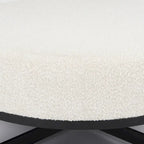 Pouf rotondo in tessuto bouclé color crema con base in metallo nero