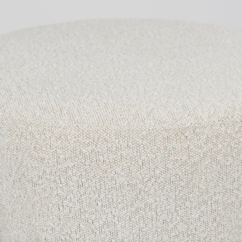 Pouf rotondo in tessuto bouclé color crema con base in metallo nero