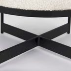 Pouf rotondo in tessuto bouclé color crema con base in metallo nero