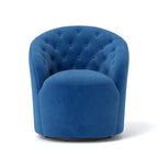 Poltrona girevole a 360° rivestita in velluto con schienale trapuntato a bottoni